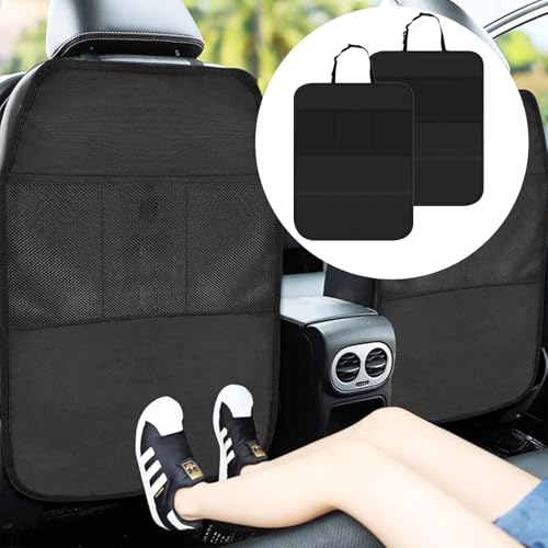 Car seat organizer with storage pockets and a footrest, placed on a car seat.