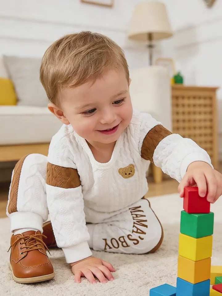 Embroidered Baby Romper “Mom’s Boy” – front view