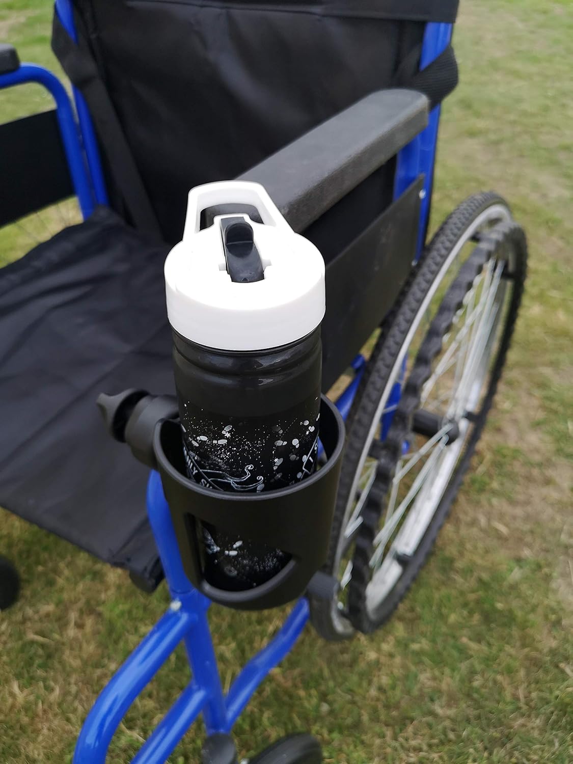 universal stroller cup holder with sippy cup attached